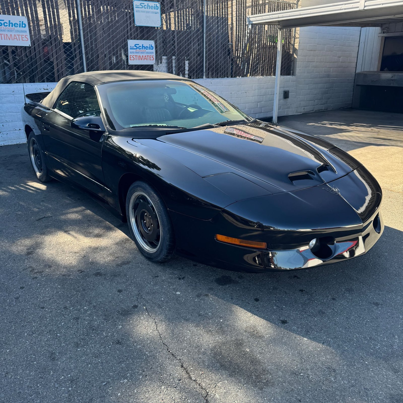 Black Pontiac Firebird at Earl Scheib of Concord